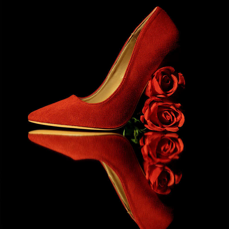 Beautiful high heels and roses stock photography series with professional foot and hand model.